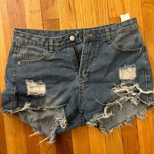 Denim distressed shorts. RUNS SMALL
